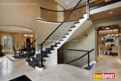 Curved stairs design near dining room
