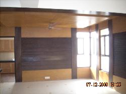 Wall panelling & wooden ceiling in family lounge at upper lvl