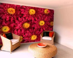 Add floral touch with floral wallpapers prints in living room