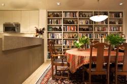 Dining Table in front of book shelf