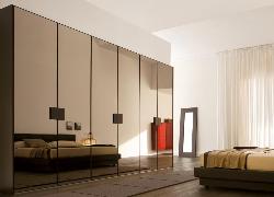Beautiful Bedroom designing with modern Wardrobe and stylish curtains designs