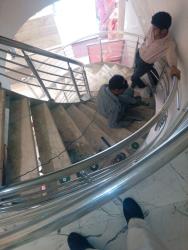 spiral stairs in showroom at KAMLA NAGAR