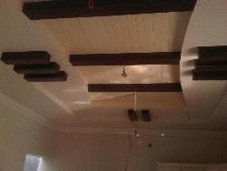 POP with wood ceiling design