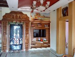 puja room with tv cabinet
