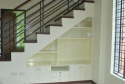 our tv and other things storage under the stairs by Jasmin Jimenez- jazimenez@yahoo.com