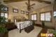 Bedroom decorated in antique style and wooden batten on ceiling 