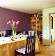 Wine colored paint on the wall, Simple wooden bookcase, Dining Room Wooden Furniture