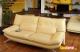 Beige colored 2 seater sofa for living room 