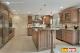 Large sized kitchen in woode with island and breakfast counter