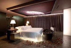 Glowing hotel bedroom Interior Design Photos
