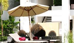 An umbrella outside your home can improve your style tremendously Balcony outside sitting