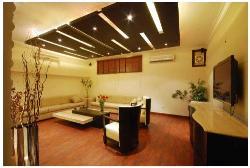 Living room interior emphasize on ceiling design and furniture placement Placement of gods phots