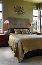 Single Bed design with upholstered headboard and large windows for ventilation Corner ventilation