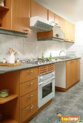 Wooden Cabinets in Kitchen with white colored cooking range and hood Interior Design Photos