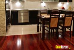 tile floor for open kitchen and wooden floor for dining area Interior Design Photos