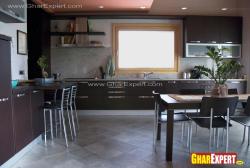 Large modular kitchen in brown Interior Design Photos