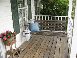 Porch Swing Porch with round colam