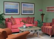 Well Decorated Living room with Colourful Sofa and Pillows Interior Design Photos