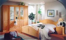 Door sized windows in the bed room bring-in good sunlight Er almirah vanear