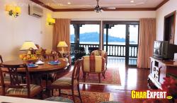 Simple traditional living cum dining with balcony view Hall cum
