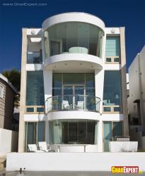3 storey curved balconies exterior elevation design  Triple storey with stilt parking