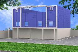 Elevation of showroom and shops Shop with resident