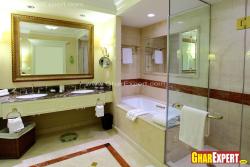 Bath tub and shower enlosure in full fledged bathroom Full photo of celling