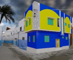 Arabic Style elevation design with  blue and yellow on Exterior facade Shop facade