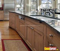 wooden kitchen cabinets with granite countertop and ceramic sink Granite laying