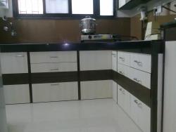 Kitchen cupboard design in laminates Sliding wardrob laminate design