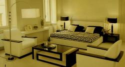 Light color bedroom theme with stylish bedroom table  in the bed