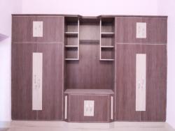 wardrobe designs for bedroom using laminates and place for TV Interior Design Photos