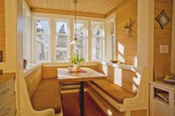 dining area of a wooden villa Interior Design Photos