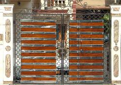 Exterior gate design with the combination of wood and and stainless steel    Maharaja get combination