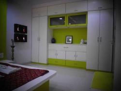 Wardrobe cum multi storage unit-Priyan Interior Design Photos