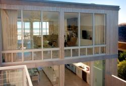 Entry Deck of Ocean Walk House, Fire Island Covered deck