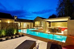 swimming pool and outdoor seating  with exotic lighting in villa Design of swimming pool