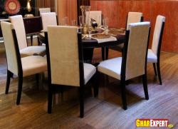 Round table and hardwood floor in dining area Interior Design Photos