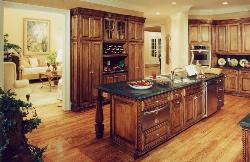 Rustic style kitchen cabinets and sink over the granite counter top Stair