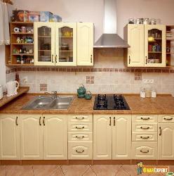 One line simple and elegant modular kitchen with ivory colored cabinets Interior Design Photos
