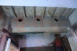 Brickwall kitchen chimney outlet pipeline after making holes/core cutting work Making a