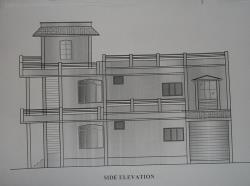 Elevation of building on corner plot  Corner almira