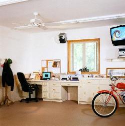 Home office in garage Interior Design Photos
