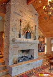 fireplace unit on stone cladded wall Stone farce designs