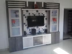 TV Unit with showcases cubbord. Interior Design Photos