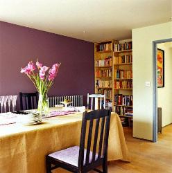 Wine colored paint on the wall, Simple wooden bookcase, Dining Room Wooden Furniture  of wooden cupboards